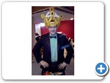Jason sporting a Tuxedo wearing the Prom King crown